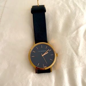 The Horse black leather and gold watch